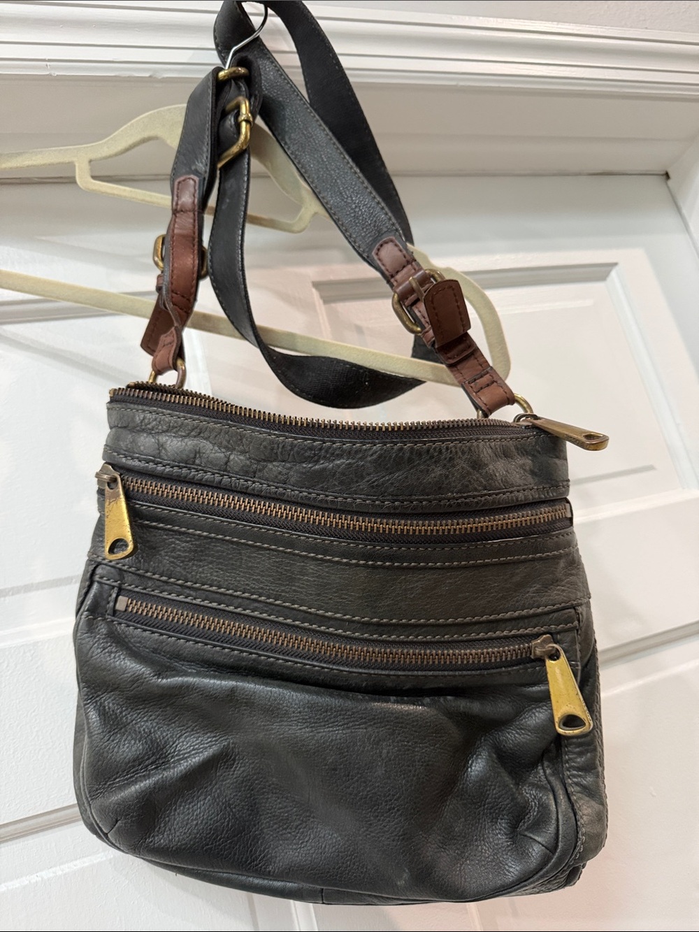 Fossil Black Leather Crossbody Bag with Brass Zippers